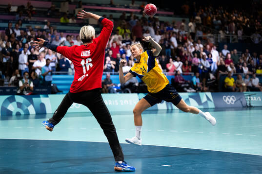 Goalkeeper Katrine Lunde of Norway and Nathalie Hagman of
