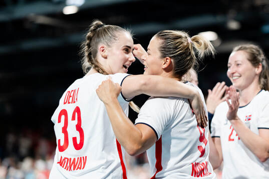 Thale Rushfeldt Deila and Nora Mørk of Norway celebrate