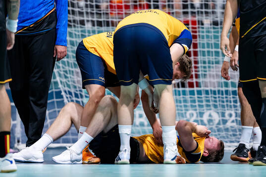 Felix Claar of Sweden in pain in a men's preliminary round