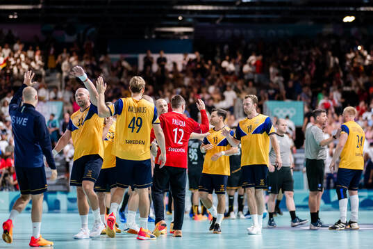 Players of Sweden celebrate
