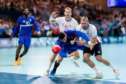 Petter Øverby and Vetle Eck Aga of Norway against Ludovic