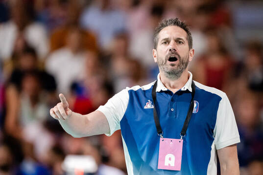 Head coach Guillaume Gille of France in a men's preliminary