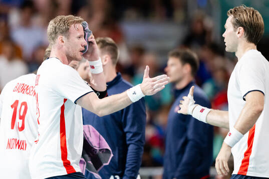 Magnus Gullerud of Norway in pain in a men's preliminary
