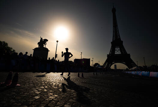 The silhouette of an athlete competing in men's 20 km race