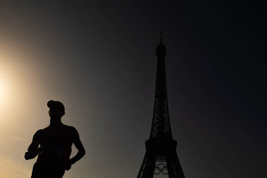The silhouette of an athlete competing in men's 20 km race