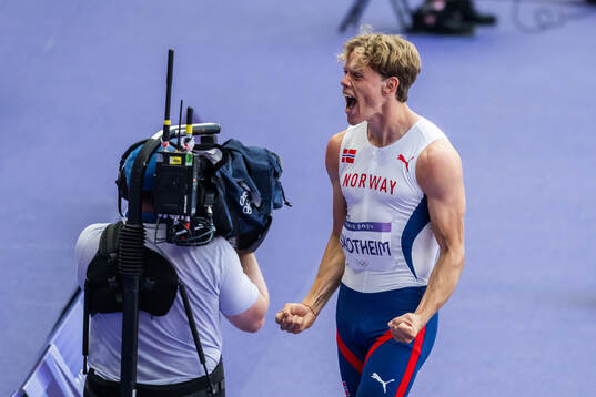 Sander Skotheim of Norway celebrates when competing in