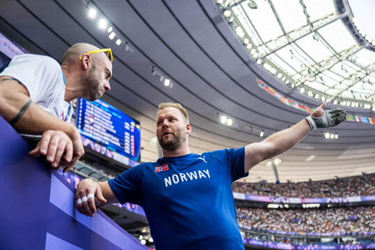 Coach Paul Solberg and Eivind Henriksen of Norway when