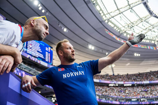 Coach Paul Solberg and Eivind Henriksen of Norway when