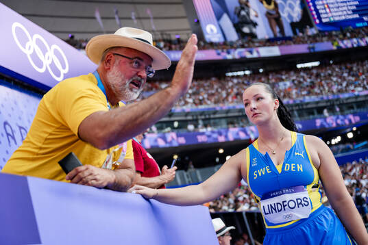 Caisa-Marie Lindfors and coach Henrik Wennberg of Sweden in