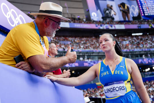 Caisa-Marie Lindfors and coach Henrik Wennberg of Sweden in