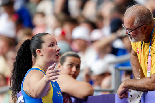 Caisa-Marie Lindfors and coach Henrik Wennberg of Sweden in