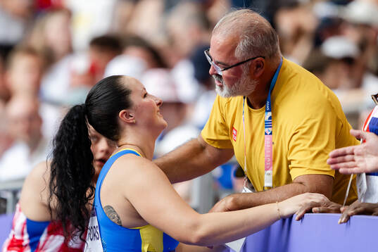 Caisa-Marie Lindfors and coach Henrik Wennberg of Sweden in