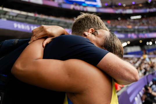 Vanessa Kamga of Sweden celebrates with coach Mats Olsson