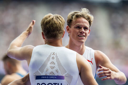Markus Rooth and Sander Skotheim of Norway celebrate