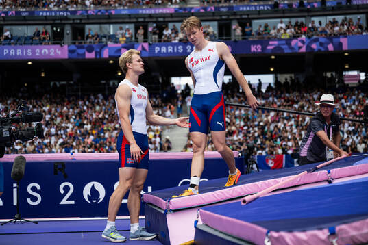 Sondre Guttormsen and Simen Guttormsen of Norway compete in