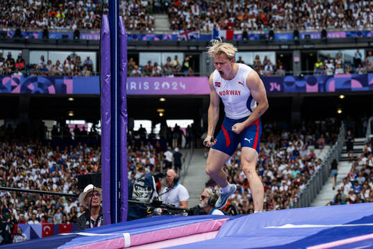 Sondre Guttormsen of Norway celebrates when competing in