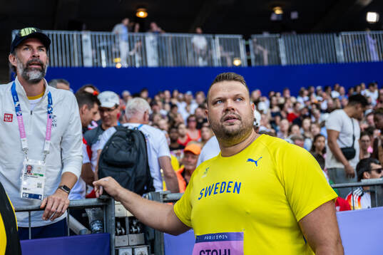 Coach Staffan Jönsson and Daniel Ståhl of Sweden when