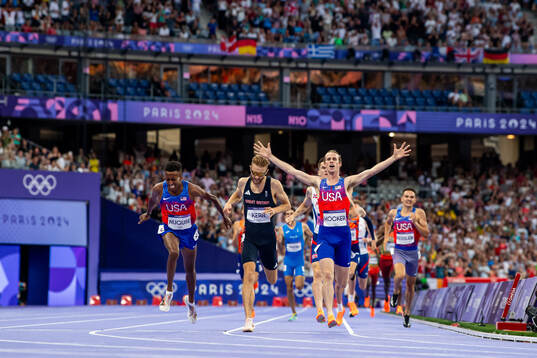 Cole Hocker of USA celebrates as he wins the men's