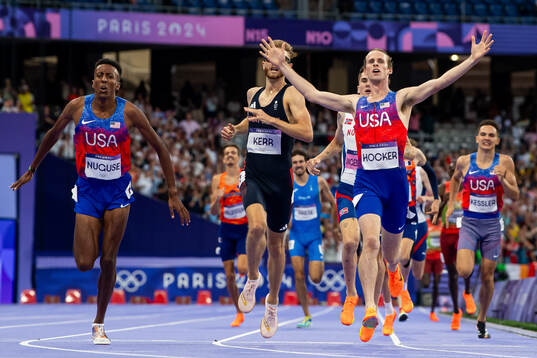 Cole Hocker of USA celebrates as he wins the men's