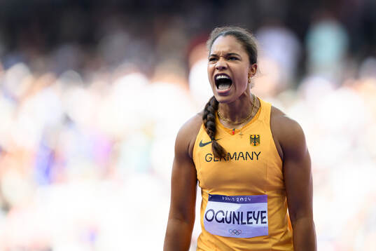 Yemisi Ogunleye of Germany celebrates in women's athletics