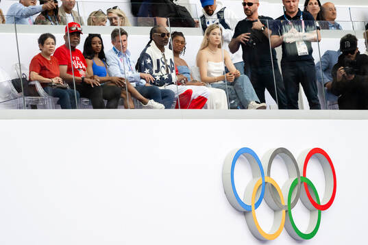 Snoop Dogg,  Sebastian Coe, President of World Athletics