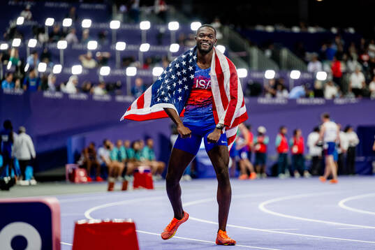 Rai Benjamin of USA celebrates