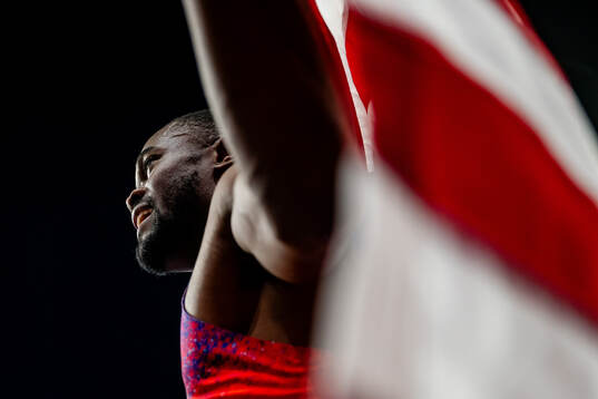 Rai Benjamin of USA celebrates