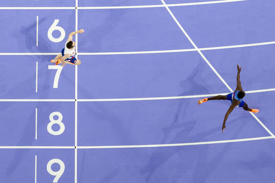 Karsten Warholm of Norway and Rai Benjamin of USA compete
