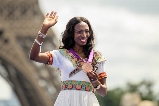 Abeba Aregawi of Ethiopia receives her bronze medal at a