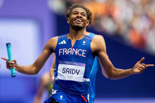 Fabrisio Saidy of France celebrates in men’s athletics
