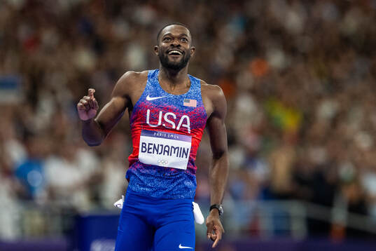 Rai Benjamin of USA celebrates