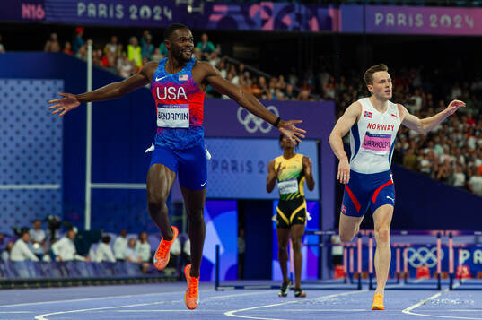 Rai Benjamin of USA celebrates winning
