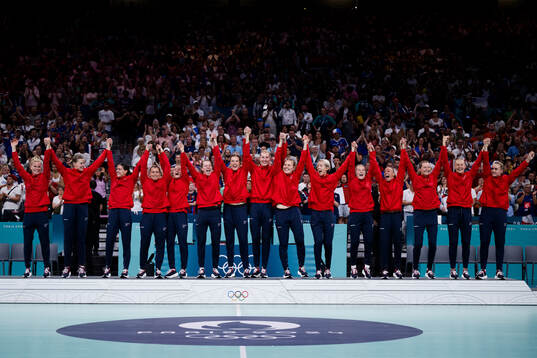 Players of Norway celebrate their gold at the medal ceremony