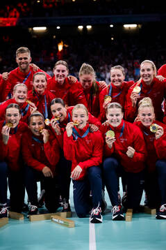 Players of Norway celebrate their gold at the medal ceremony