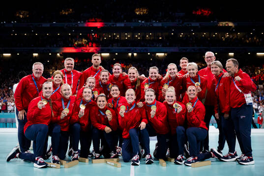 Players of Norway celebrate their gold at the medal ceremony