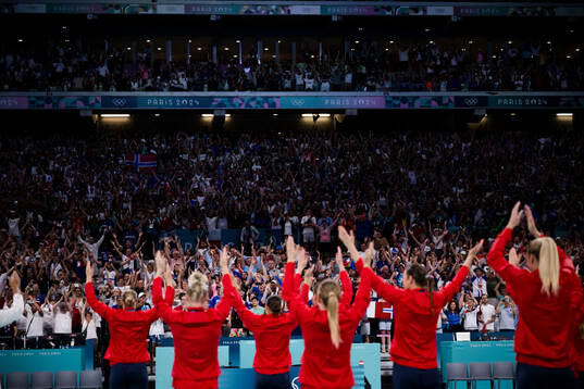 Players of Norway celebrate their gold at the medal ceremony