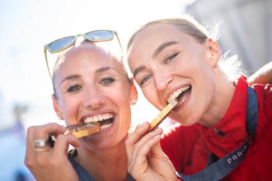 Camilla Herrem and Stine Bredal Oftedal of Norway celebrate