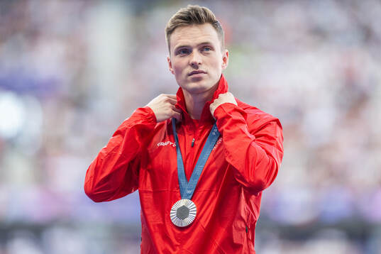 Silver medallist Karsten Warholm of Norway celebrates