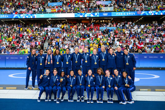 Players of USA celebrate with their gold medals