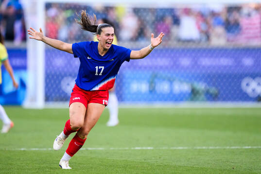 Samantha Coffey of USA celebrates