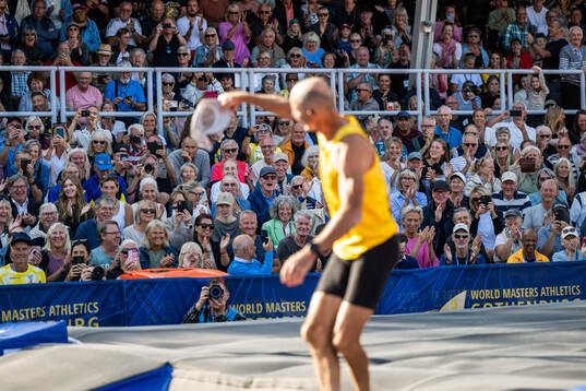Spectators watch Ingemar Stenmark of Sweden compete in