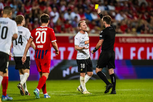 Mikkel Rygaard Jensen of Häcken receives a warning