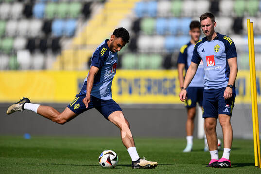 Joakim Persson and physio Rickard Engström