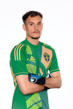 Goalkeeper Elis Bishesari poses for at portrait