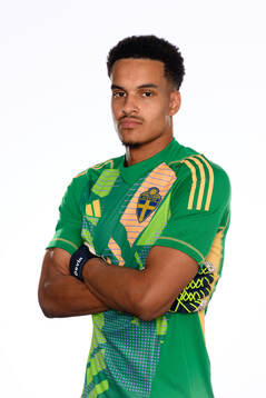 Goalkeeper Oliver Dovin poses for at portrait