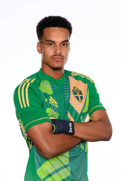 Goalkeeper Oliver Dovin poses for at portrait