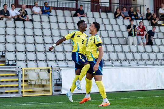 Joe Mendes and Jusef Erabi of Sweden celebrate the 2-0 goal