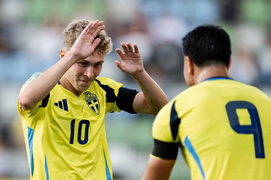 Hugo Bolin and Jusef Erabi of Sweden celebrate the 5-0 goal