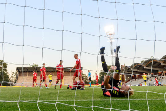 Goalkeeper Harry Victor of Gibraltar looks dejected