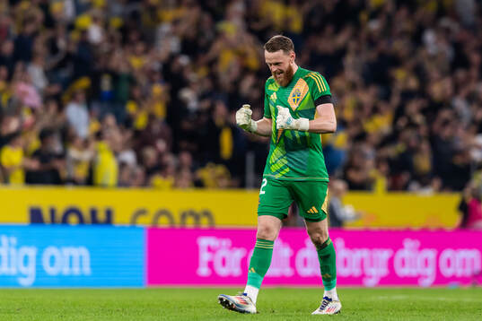 Goalkeeper Viktor Johansson of Sweden celebrates
